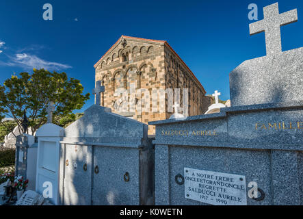 20th century tombs around Eglise de la Trinite (Trinity Church), 11th century, Romanesque style, in Aregno, Balagne micro-region, Haute-Corse, Corsica Stock Photo