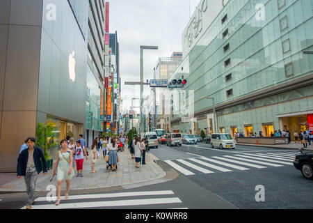 TOKYO, JAPAN -28 JUN 2017: Unidentified people Crossing the street through zebra in the Electrical Town of Ginza district, in Tokyo Stock Photo