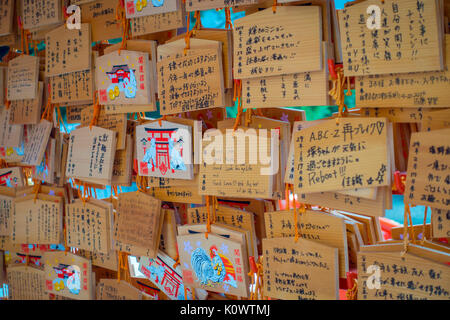 TOKYO, JAPAN JUNE 28 - 2017:Beautiful and small prayer tables at Toshogu Shrine. Ema are small wooden plaques used for wishes by shinto believers in Tokyo Stock Photo