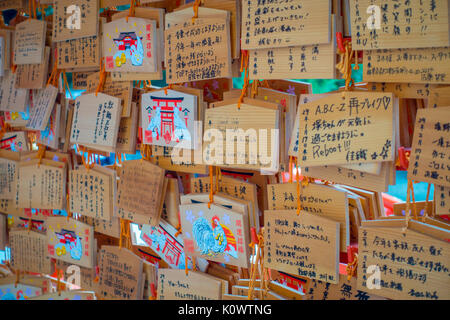 TOKYO, JAPAN JUNE 28 - 2017:Beautiful and small prayer tables at Toshogu Shrine. Ema are small wooden plaques used for wishes by shinto believers in Tokyo Stock Photo