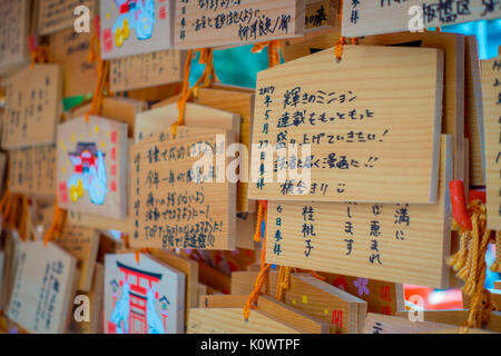 TOKYO, JAPAN JUNE 28 - 2017:Beautiful and small prayer tables at Toshogu Shrine. Ema are small wooden plaques used for wishes by shinto believers in Tokyo Stock Photo