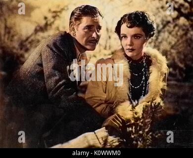 Ronald Colman and Jane Wyatt in 1937 film Lost Horizon, 1937. Note: Image has been digitally colorized using a modern process. Colors may not be period-accurate. Stock Photo