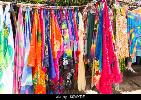 Colourful clothing and fabrics for sale on beach, Port Vila, Vanuatu ...