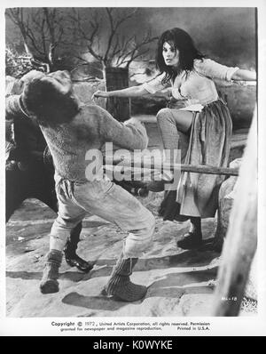 Sophia Loren, kicking a man in the face, movie still from the film Man of La Mancha, 1972. Stock Photo