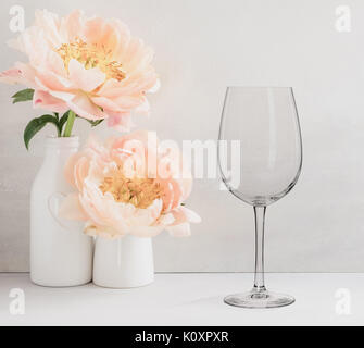 https://l450v.alamy.com/450v/k0xpxr/floral-mock-up-of-1-wine-glass-next-to-a-vase-of-flowers-perfect-for-k0xpxr.jpg