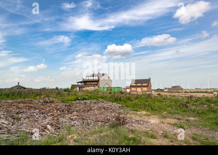 Last buildings in a ghost village at the edge of the open pit mine Garzweiler II in Germany Stock Photo
