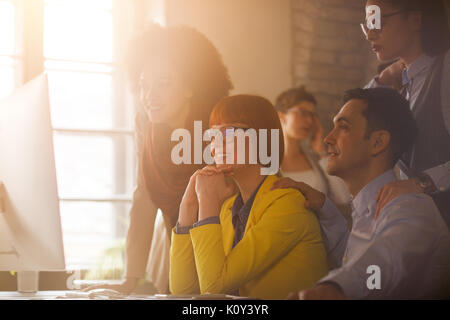Young working group with manager on briefing in office Stock Photo