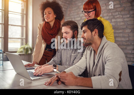 freelance web designers brainstorming together Stock Photo