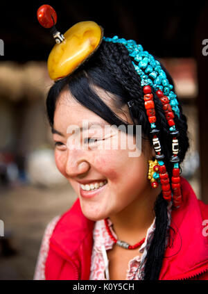 Traditional Tibetan girl. Kham, Tibetan plateau Stock Photo