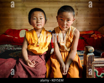 Little Tibetan buddhist monks. Kasongdu village Stock Photo