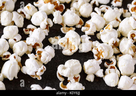 fresh popcorn close up on black table background Stock Photo
