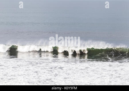 Huge splashing wave in ocean coast in Bali. Best place for surfing Stock Photo