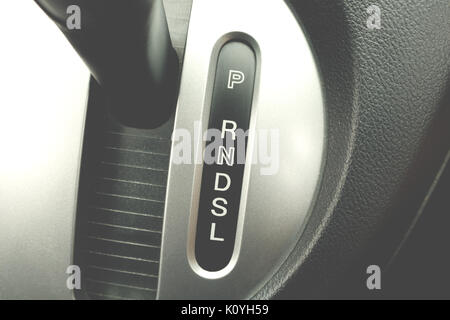 Gear shift handle in a modern car, automatic gear shift of a compact car. Stock Photo
