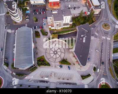 View of a traffic circle and buildings, Kopavogur, Iceland, a suburb of Reykjavik. Stock Photo