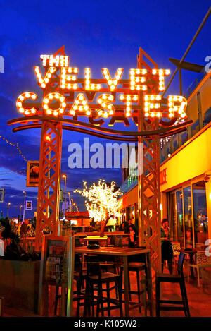 The Velvet Coaster Wetherspoon pub at night on Blackpool Promenade Stock Photo
