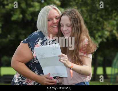 Millie Robson, 15, who was injured in the Manchester Bombings celebrates taking her GCSE English a year early, with her mother Marie, 43, at Woodham Academy in Newton Ayrcliffe. Stock Photo