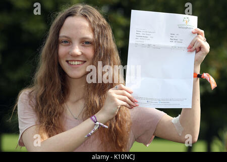 Millie Robson, 15, who was injured in the Manchester Bombings celebrates taking her GCSE English a year early, at Woodham Academy in Newton Ayrcliffe. Stock Photo