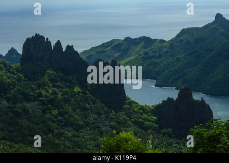 The stunning scenery looking down at Hatiheu bay on Nuku Hiva, Marquesas, French Polynesia Stock Photo