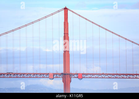Golden Gate Bridge suspension tower and blue sky