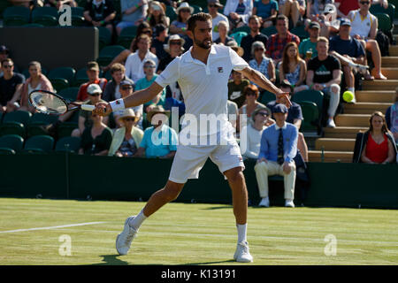 Marin Cilic of Croatia in action at the Gentlemen's Singles - Wimbledon Championships 2017 Stock Photo