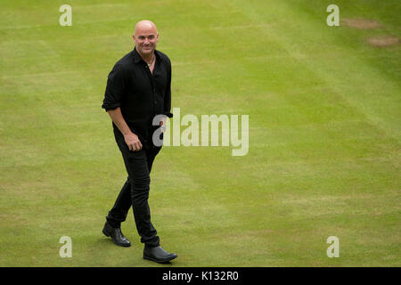 Andre Agassi walks on Centre Court at the Wimbledon Championships 2017 Stock Photo