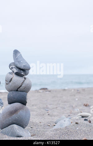 Blue Beach Rocks Stacked Monochrome, Serene, Blue Stacked rocks on a California beach ...