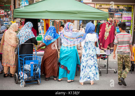 Pakistani-Americans celebrate Pakistani Independence Day at a 'Mela' or gathering on Coney Island Avenue in Brooklyn in New York on Sunday, August 20, 2017. Beside entertainment the street fair featured merchants selling ethnic clothing and foods of Pakistan. (© Richard B. Levine) Stock Photo