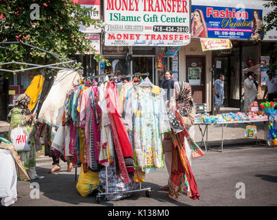 Pakistani-Americans celebrate Pakistani Independence Day at a 'Mela' or gathering on Coney Island Avenue in Brooklyn in New York on Sunday, August 20, 2017. Beside entertainment the street fair featured merchants selling ethnic clothing and foods of Pakistan. (© Richard B. Levine) Stock Photo