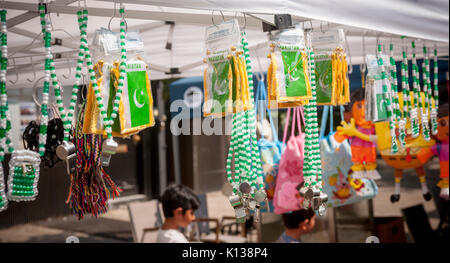 Pakistani-Americans celebrate Pakistani Independence Day at a 'Mela' or gathering on Coney Island Avenue in Brooklyn in New York on Sunday, August 20, 2017. Beside entertainment the street fair featured merchants selling ethnic clothing and foods of Pakistan. (© Richard B. Levine) Stock Photo