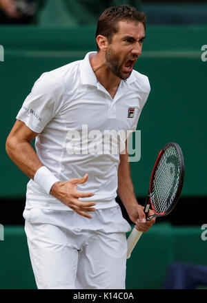 Marin Cilic of Croatia celebrates a point at the Gentlemen's Singles - Wimbledon Championships 2017 Stock Photo