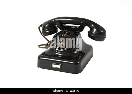 Old black rotary dial telephone Stock Photo