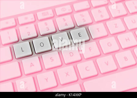 Computer keyboard spelling love instead of QWERTY Stock Photo