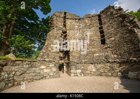 Imposing remains of ancient Dun Telve broch, dry stone Iron Age roundhouse near Glenelg, Scotland Stock Photo