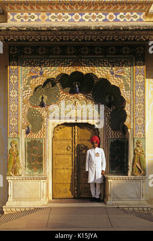 Guard at Peacock Door, Mahajara's City Palace, Jaipur, Rajasthan, India Stock Photo