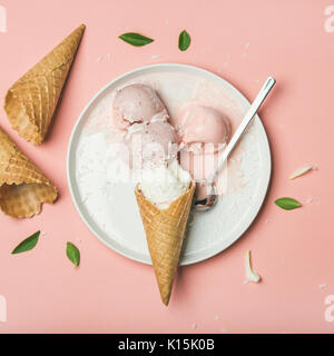 Flatlay of strawberry and coconut ice cream scoops, square crop Stock Photo