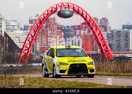 Moscow, Russia - Apr 18, 2015: Mitsubishi Lancer driver Kenavs Marcis and co-driver Gatis Cimdins during the Rally Masters Show 2015 at the Krylatskoy Stock Photo