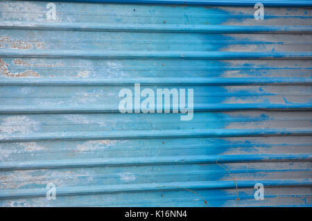 Wavy walls are made ​​of aluminum is painted in shades of blue. Stock Photo