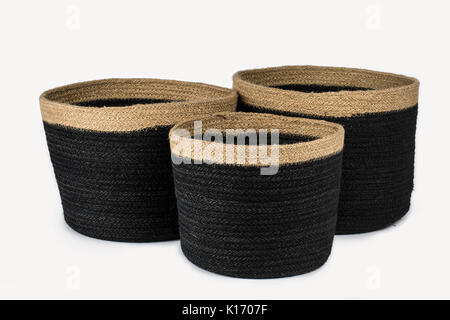 SET OF TWO LARGE RECTANGULAR NATURAL PLANT FIBRE BRAIDED BASKET WITH HANDLES  ISOLATED ON WHITE BACKGROUND Stock Photo