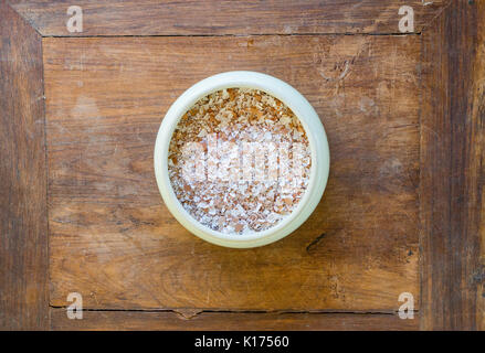 Shredded egg shells in a bowl are a necessary food supplement for chicken Stock Photo
