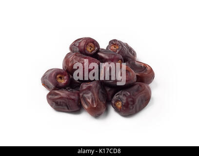 Heap of pitted dates isolated on white background.