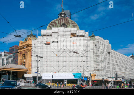 Shrouded in protective scaffolding, Melbourne's iconic Flinders Street Station awaits restoration work, in winter 2017 Stock Photo