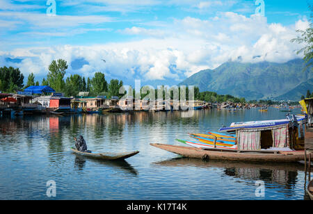 Srinagar, India - Jul 23, 2015. Landscape of Dal Lake in Srinagar, India. The lake is also an important source for commercial operations in fishing an Stock Photo