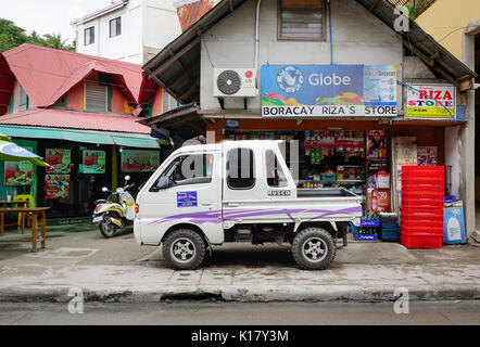 Kalibo, Philippines - Dec 17, 2015. Vehicles on street in Boracay island, Philippines. Boracay Island has received awards from numerous travel publica Stock Photo