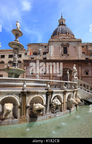 Sicily, the old town of Palermo, the Piazza Pretoria, part of the Manneristic Fountain Fontana Pretoria and in the background the Dominican church San Stock Photo