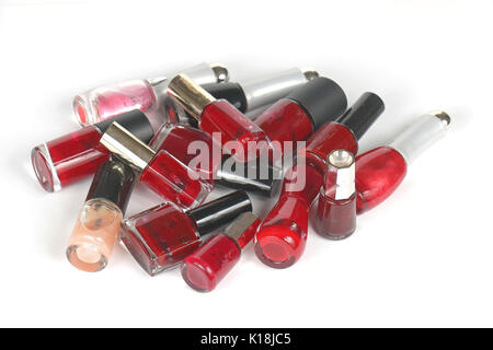 Large heap of glass nail varnish bottles Stock Photo