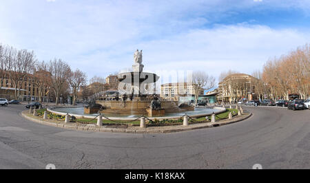 AIX-EN-PROVENCE, FRANCE - JANUARY 31; The Fontaine de la Rotonde is a historic fountain with car traffic roundabout in Aix-en-Provence, France - Janua Stock Photo
