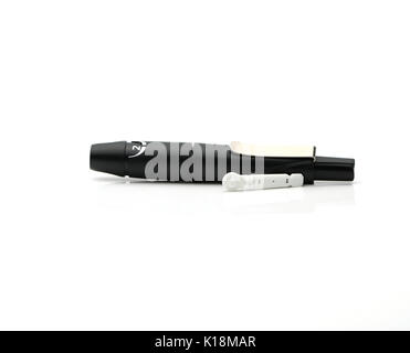 Lancing pen device isolated on white background with copy space Stock Photo