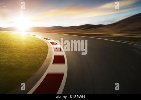 Motion blurred racetrack with mountain background , warm mood Stock Photo