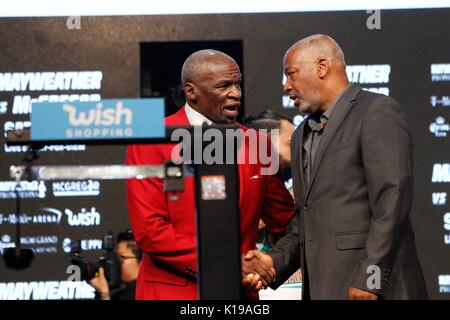 Floyd Mayweather, left, and Conor McGregor exchange harsh words during ...