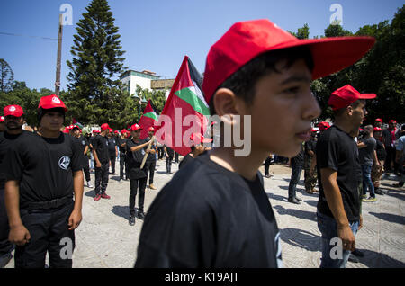 August 26, 2017 - Gaza City, The Gaza Strip, Palestine - The Palestinians are participating in a rally organized by the Popular Front for the Liberation of Palestine (PFLP) to commemorate the anniversary of the founder of the movement, Abu Ali Mustafa, and to end the division in Gaza City. (Credit Image: © Mahmoud Issa/Quds Net News via ZUMA Wire) Stock Photo